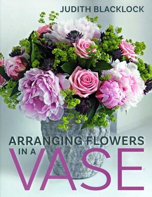 Arranging Flowers in a Vase image number 0