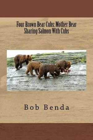 Four Brown Bear Cubs: Mother Bear Sharing Salmon With Cubs image number 0