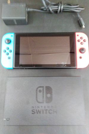 Nintendo Switch with Neon Blue and Neon Red Joy-Con image number 0