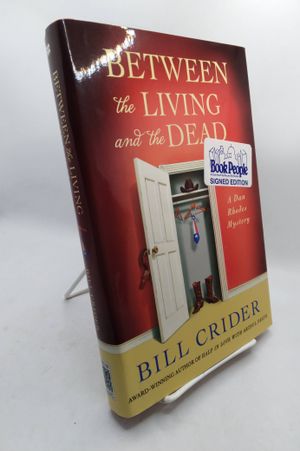 Between the Living and the Dead: A Dan Rhodes Mystery (Sheriff Dan Rhodes Mysteries) image number 0