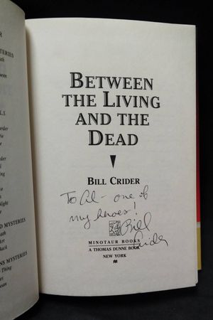 Between the Living and the Dead: A Dan Rhodes Mystery (Sheriff Dan Rhodes Mysteries) image number 1