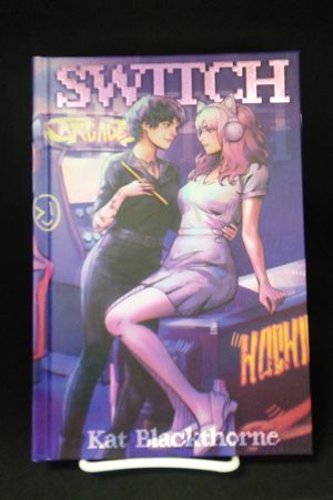 sWitch: a dark sapphic rom-com (Read In Peace Book Box Edition) image number 0
