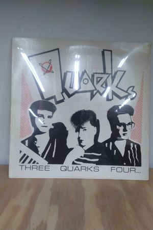 Three Quarks Four image number 0
