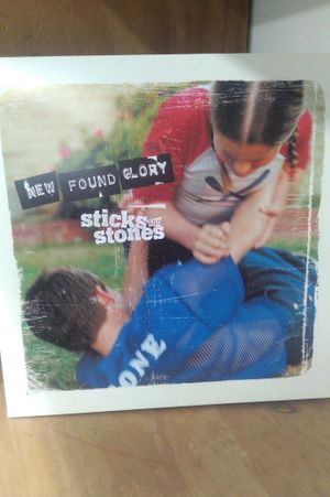 Sticks And Stones [ 20th Anniversary Edition Blue Clear with Red Splatter ] image number 0