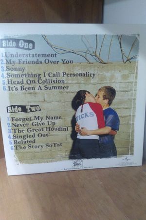 Sticks And Stones [ 20th Anniversary Edition Blue Clear with Red Splatter ] image number 1