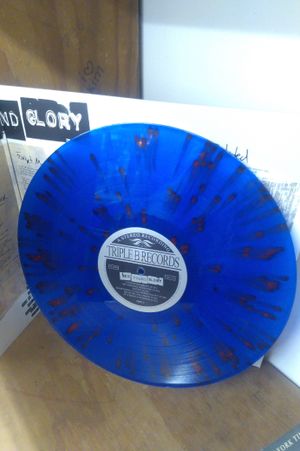 Sticks And Stones [ 20th Anniversary Edition Blue Clear with Red Splatter ] image number 2